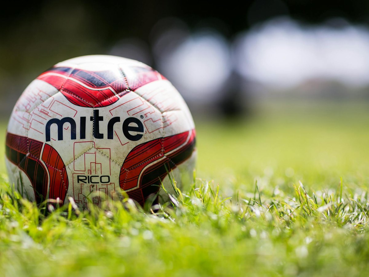 Match football — soccer ball on grass (product-style close-up)
